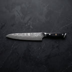 Genbu Gyuto Chef Knife – on the board