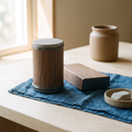 Shirosuki rolling diamond sharpener with its walnut base block on a kitchen counter